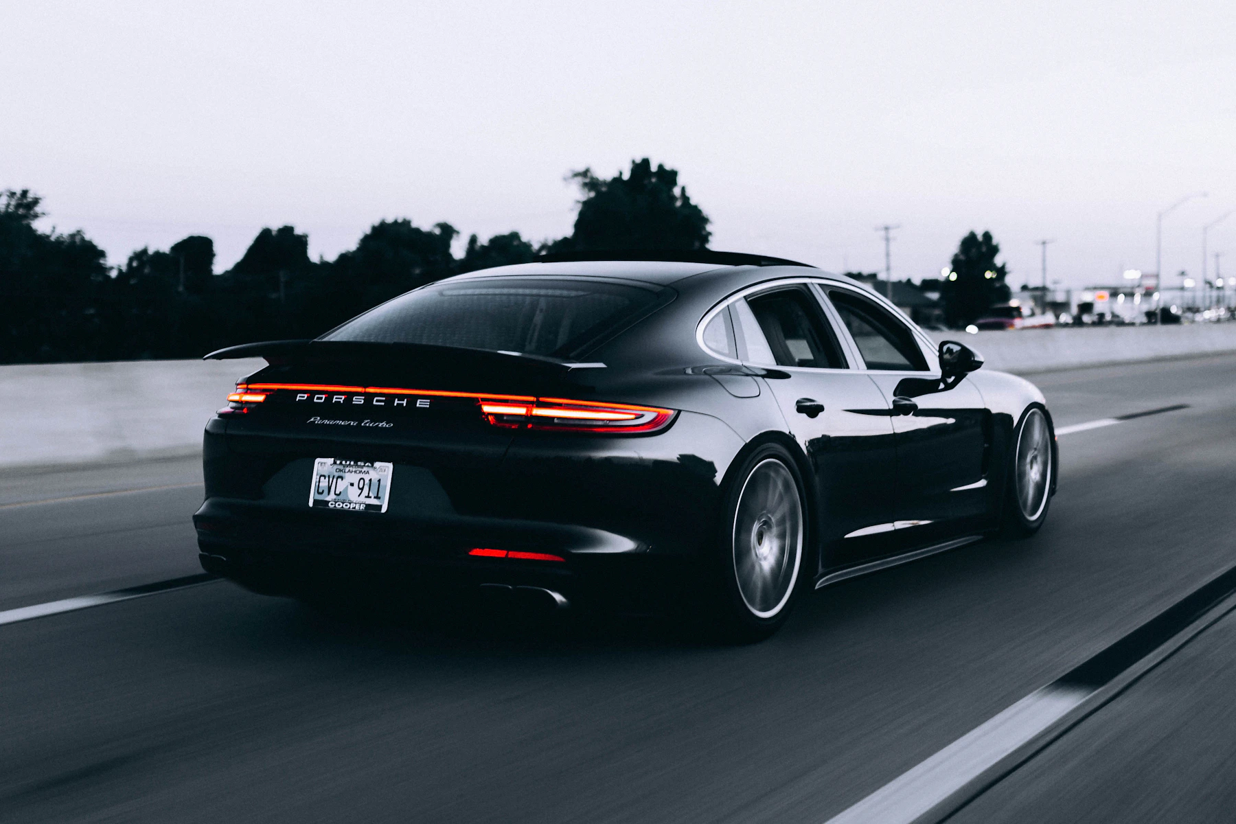 Illustrative silver sports car and bodywork